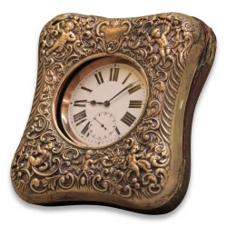 \"Onion\" pocket watch with its silver travel case.